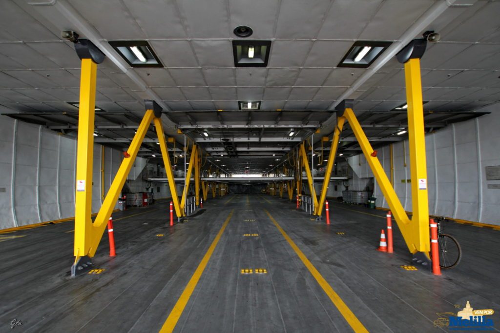 Empty vehicle deck with cargo tie-down rigging